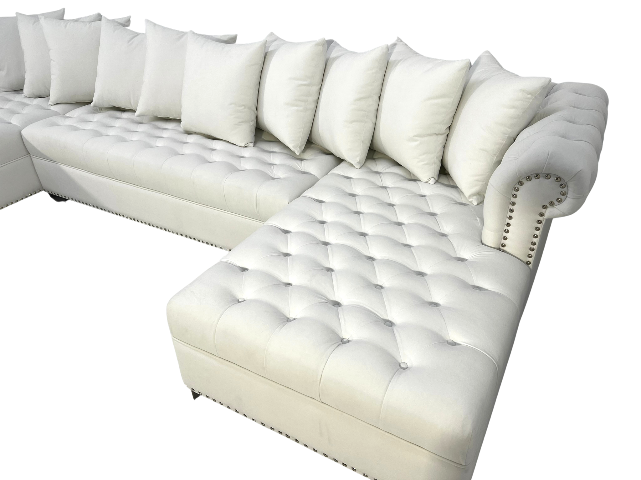 The Kayle White Sectional In suede with tufted seats